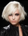 Blonde bob with razor cutting and side bangs