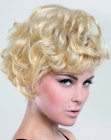 Short hairstyle with a slight A-line and piled up curls