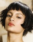 Short bob with curved front angles and very short bangs