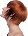 Red hair with mushroom cut elements and a long graduated neck line