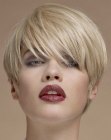 Short hairstyle with long diagonal bangs and a round shape