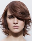 On trend short hairstyle with feathery layers and wispy ends