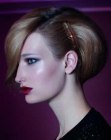 Glamour hairdo for short hair with a plunging front