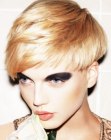 Expressive short above the ears haircut with longer top hair