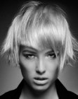Short bob with flipped out sides and triangle bangs