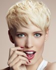 Blonde pixie cut with elements of a bowl cut