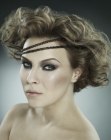 Short hairdo with airy curls and a double headband