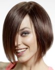 Sleek shorter in the neck bob with an angled cutting line