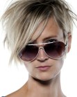 Ruffled short hair with strands that stick out