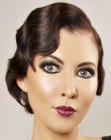 Short vintage hairstyle with waves and a very feminine shape