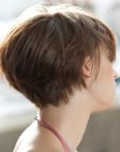 Side view of a short hairstyle with graduation and layering