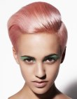 Pink pixie cut with the hair combed to the back