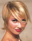 Feminine short hairstyle with layering and long bangs