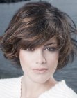 Short and trendy women's hairstyle with volume and movement