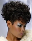 Hairstyle with clipper cut sides and curls for black hair