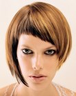 Bob haircut with one shorter side and angled bangs