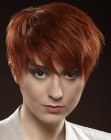 Dynamic short hairstyle with layers and much volume on the crown