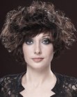 Short hairstyle with diagonal bangs and big curls