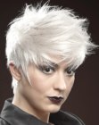 Trendy short hairdo with spiky textured hair