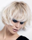 Short blonde bob with styling for a bed head effect