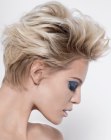 1980s inspired flipped back hairstyle with a short nape