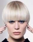 Blonde high fashion bowl cut with fine layers