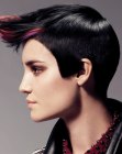 Sleek short hairstyle with sharp lines and outward jutting bangs