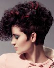 Short graduated hair with a curled top section