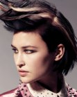 Light hairstyle with feathering and color streaks