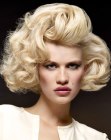 Marilyn Monroe inspired hairstyle with large blonde curls