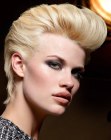 Short hairstyle with a curled quiff and a longer neck section