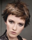 Short hairstyle with super short bangs that open up the face
