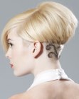 Short hairstyle with an undercut section and a hair tattoo