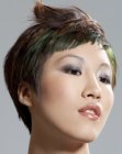 Short Asian hair with a green color accent