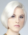 Platinum blonde chin length bob with lift on the side bangs