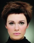 Short hairstyle with uprising hair ends and a wispy appearance