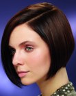 Short brunette bob with a longer front that touches the chin