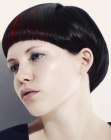 Short bowl style haircut with fluid structure