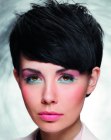 Modern short haircut with much texture and diagonal bangs