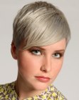 Short silver hair with long across the forehead bangs