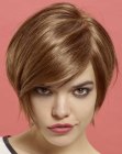 Short round hairstyle that accentuates the face