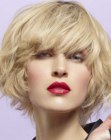 Blonde chin length bob with soft and wispy edges
