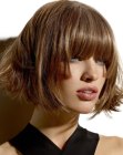Short bob with flipped out ends and a trapeze shape