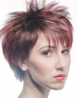 Short layered haircut with feathery texture and spikes