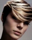 Short hairstyle with blonde over black hair coloring