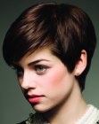 Flattering short hairstyle with elements of a pixie and a boy cut