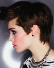 Short punk inspired haircut with lifted bangs for women