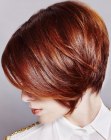 Classy short hairstyle with a rounded back and graduated texture