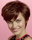 Short brunette pixie hair that you can style with your fingers