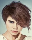 Short hairstyle with rounded body and sides that cover the ears